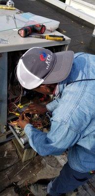 Haile changing the circuit board of my unit.