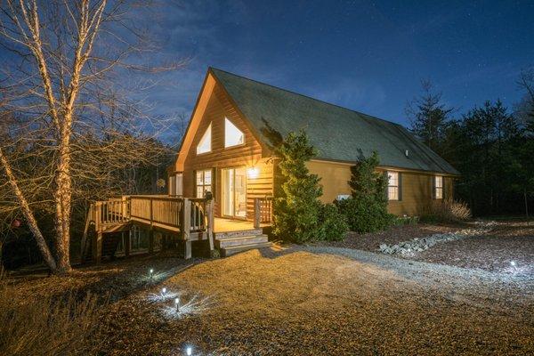 Welcome home.  Cottage at night