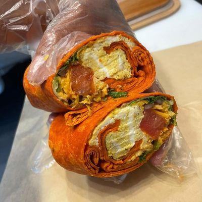 Breakfast wrap filled with turkey sausage, egg, cheese, and veggies.