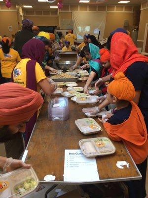 Preparing lunch boxes for shelters all across tri state area