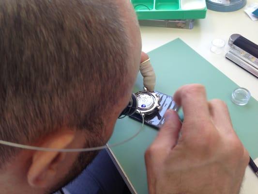 Patrick Desbioless Working on a Ulysse Nardin timepiece, Ulysse Nardin Watch Repair