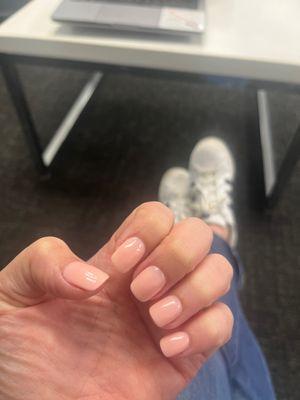 Clean perfect dip manicure in a pale pink.