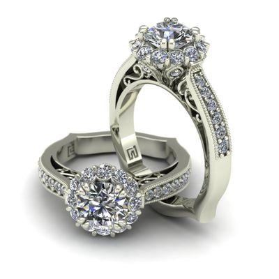 One carat round brilliant cut diamond in halo solitaire