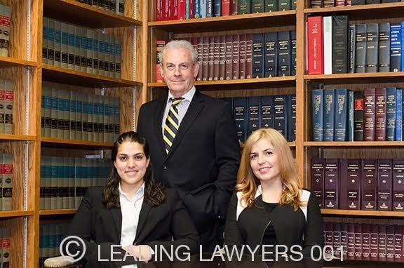 John Moran (Owner), Jawayria Z. Kalimullah (Associate Attorney), and Nerdisa Muratagic (Administrator)