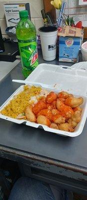 Sweet and sour chicken, veggie egg roll and mountain dew