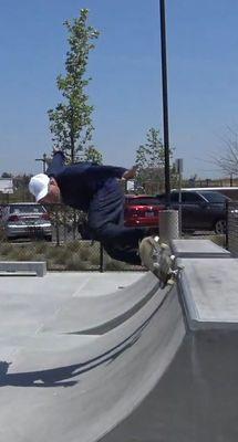 Skateboarding a vertical ramp