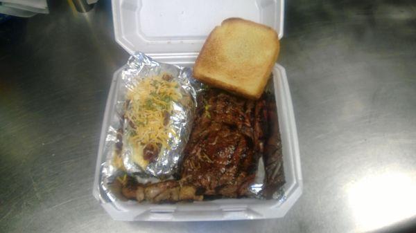 18oz ribeye dinner special comes with a loaded baked potato side salad and Texas toast for $24.95