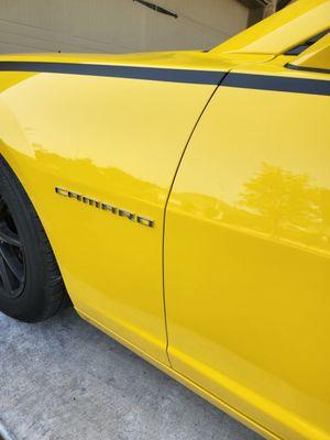 AFTER repairs on the vehicle. Great job matching the paint, stripe and affixing a new "Camaro" nameplate.