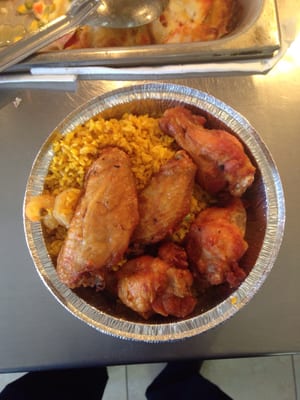 Chicken wings and shrimp fried rice.