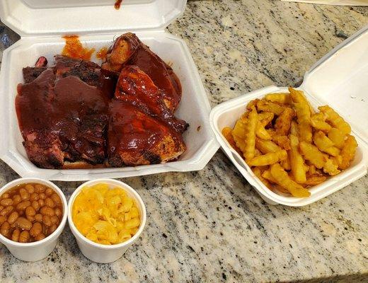 Ribs and Chicken Combo with:    Fries, Beans, and Mac-N-Cheese