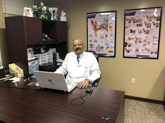 Dr Parthasarathy at his office in Glen Carbon, IL