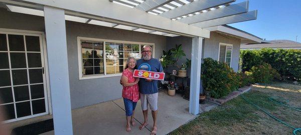 Buddy and His wife after selling their parents property in Poppet FkatS