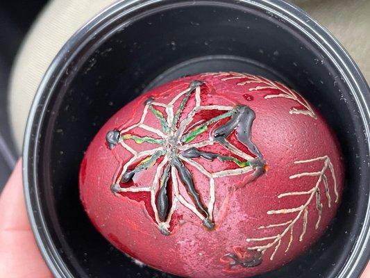 Hollow egg that still needs the final step of melting the beeswax off of it.