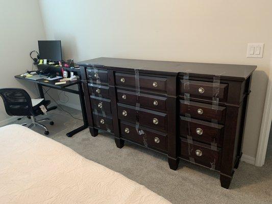 Large dresser that needed to be moved up a flight of stairs.