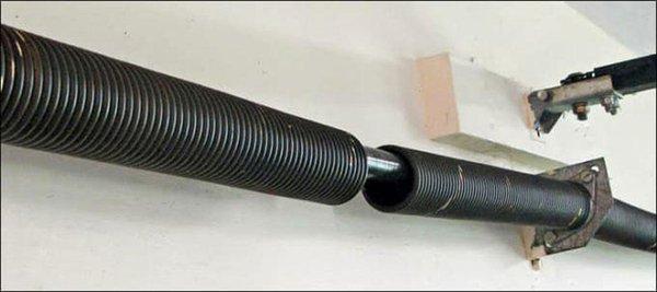 Broken garage door spring is one of the problems that can prevent garage door from closing...