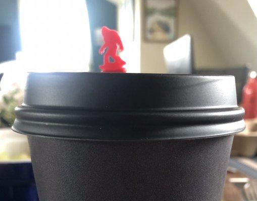 Bigfoot walking across my coffee cup lid