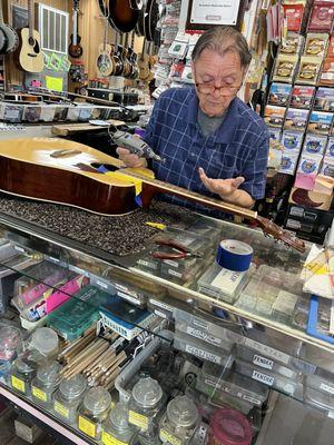 Owner John serving my guitar