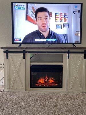 They can install an electric fireplace to this tv stand.