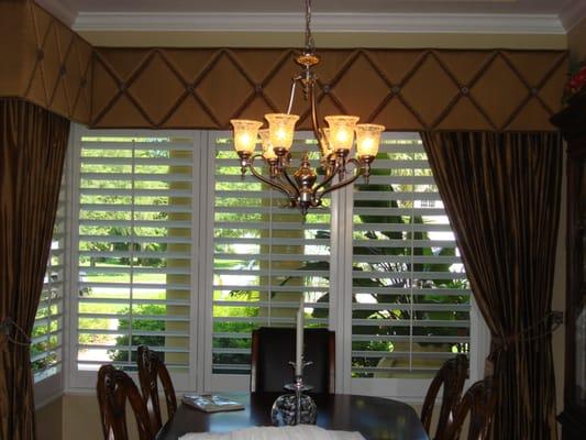 Beautiful plantation shutters with custom cornices and side panels!