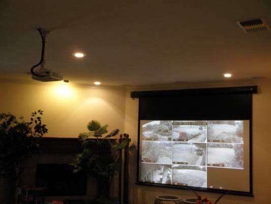 motorized projector screen, projector installation, 5.1 in-ceiling speaker installation, whole house audio and 8 camera dvr