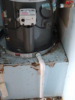 Water Heater drip pan w/ overflow to floor.