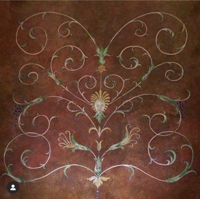 Italian baroque design. Deep red and copper faux finish  finish with free hand painted design