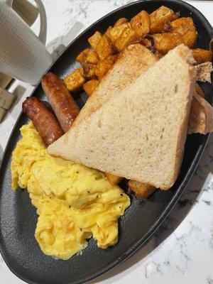 CLASSIC BREAKFAST* two cage-free eggs, choice of turkey bacon, chicken sausage or applewood smoked bacon, seasoned potatoes, and toast