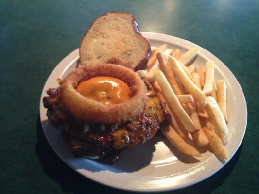 Clubhouse burger- 1/3 pound-hand pattied burger with cheddar jack, jalapeños, an onion ring, and our homemade barbecue sauce.