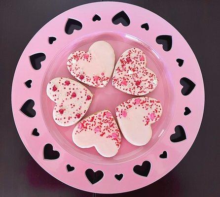 Orange-vanilla bean sugar cookies decorated with royal icing and topped with sprinkles