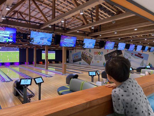 Restaurant setting next to Bowling alley