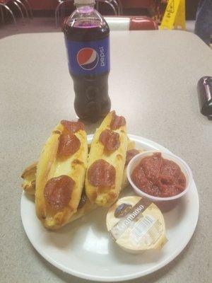 Cheess-stuffed breadsticks topped with pepperoni