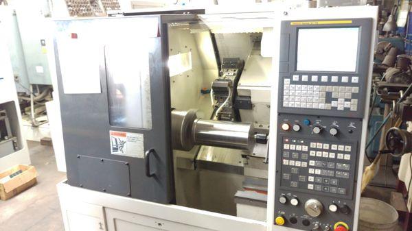 Machining 17-4 SS 5.5 Diameter to 2.5 Diameter Removing 55 lbs of material on our new Lathe