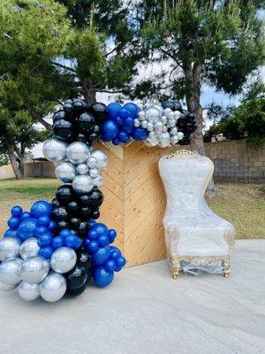 Balloon garland, chevron backdrop and throne chair