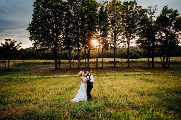 Lizzy and Chris at Two Hearts Vineyard. Photo by James Ferrara.