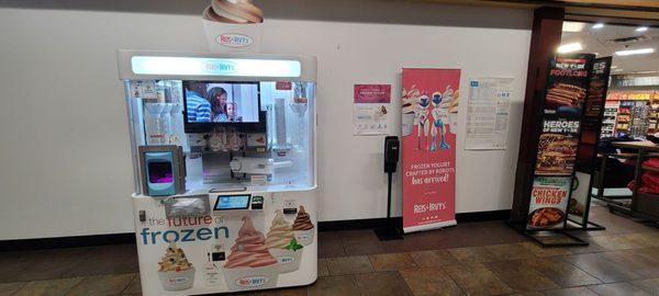 Automated frozen yogurt dispenser.