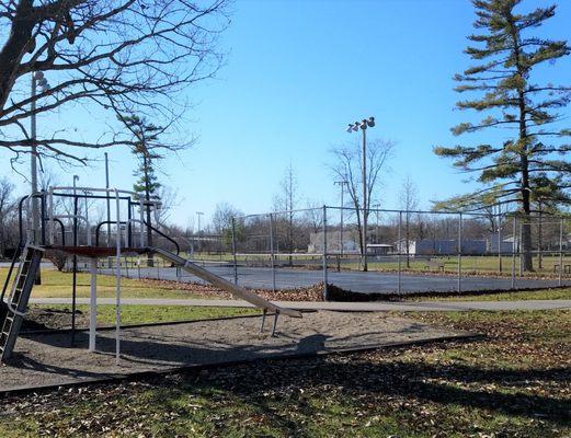 tennis courts and more playground equipment