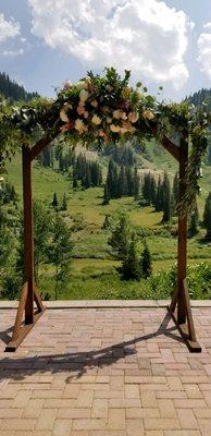 Wedding arch floral arrangement.