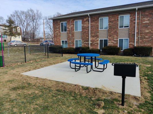 Picnic area by studio buildings