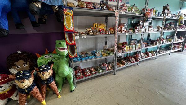 Variety of Mexican candy and piñatas