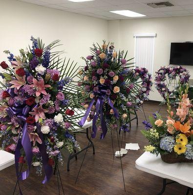 2 - stand arrangements and 2 - open heart arrangements.  They were big!  (Don't know where the one in peach is from)