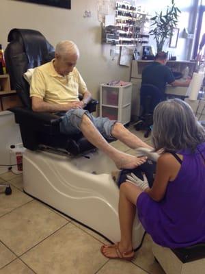 Lisa giving my Dad a pedicure.