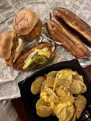 Crispy Chicken Sliderz, Nacho Cheese Platter, and Hot Dogs.