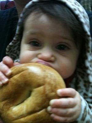 Brooklyn is enjoying her bagel.