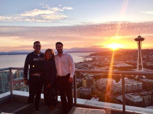 Happy customers and Chosen Family high above Seattle at Insignia Condominiums-