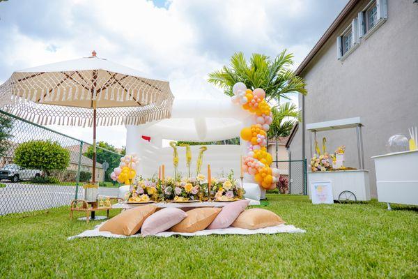 9ft and 3ft Balloon Garland on White Bounce House(Bouncing Palm Beach) for a Sweet Lemonade Theme Party