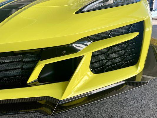 2023 Corvette Z06 front bumper fascia custom painted and colored matched Accelerate Yellow and cut to Carbon Flash Black