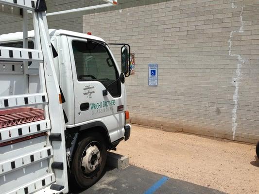 Nice parking job! When I told the worker he was parked in a handicap spot he said "I know, it was the only spot available"