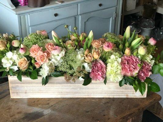 rustic wood box filled with flowers