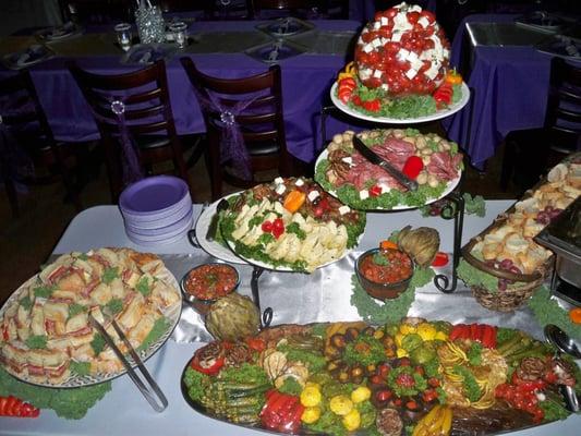 Our Antipasto Display with Balsamic Marinated Roasted Vegetables and Pressed Antipasto Sandwich Bites