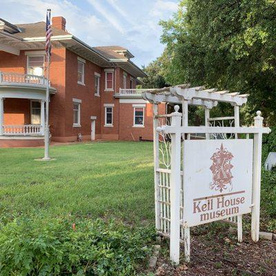 Side yard of the Kell House Museum in the morning.